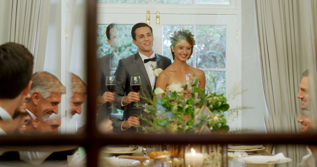 Joyful Wedding Celebration with Smiling Bride and Groom Toasting - Free Images, Stock Photos and Pictures on Pikwizard.com