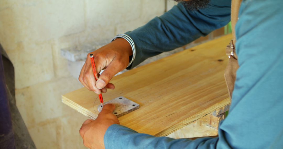 Precise Woodworking: Man Marking Wood with Metal Square Tool - Free Images, Stock Photos and Pictures on Pikwizard.com