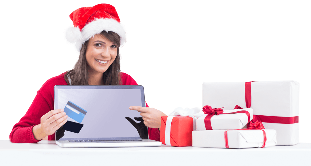 Woman in Santa Hat Displaying Credit Card on Laptop with Transparent Gifts