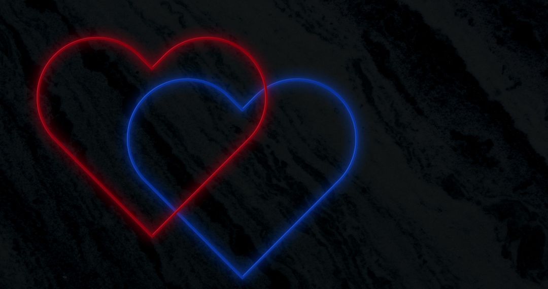 Intertwined Red and Blue Neon Hearts on Dark Background