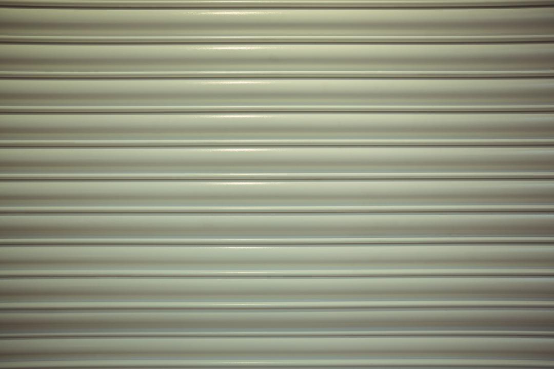 Close-Up of Closed Metal Security Shutter - Free Images, Stock Photos and Pictures on Pikwizard.com