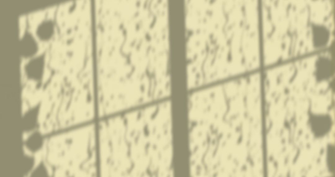 Leaf and Rain Pattern on Yellow Wall