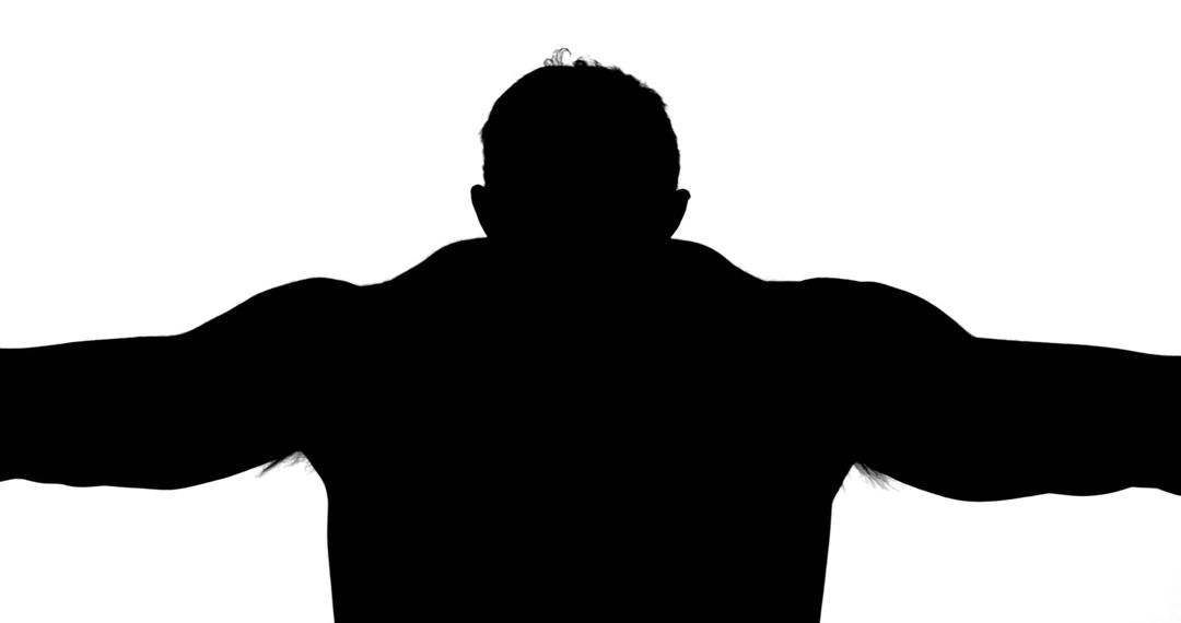 Silhouette of Athletic Male with Outstretched Arms - Free Images, Stock Photos and Pictures on Pikwizard.com