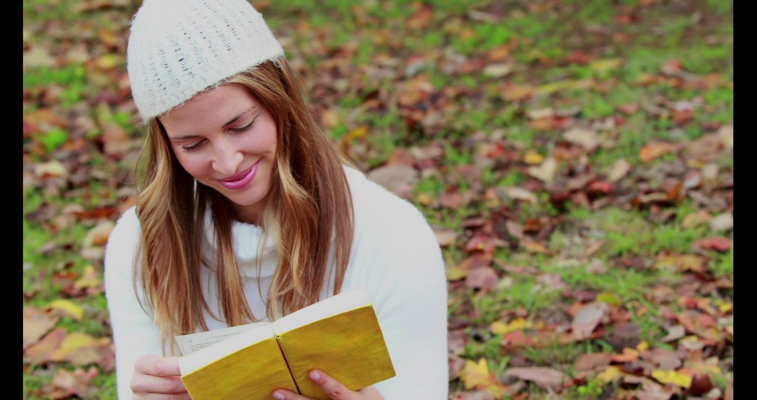 Young Woman Reading Book in Autumn Park - Free Images, Stock Photos and Pictures on Pikwizard.com