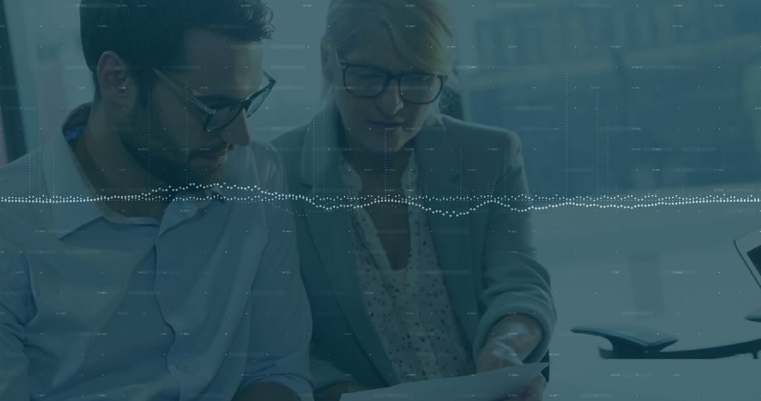 Diverse Colleagues Analyzing Data with Digital Overlay in Office