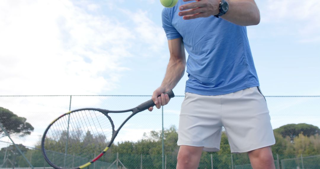 Man Playing Tennis Outdoors in Blue Shirt and White Shorts - Free Images, Stock Photos and Pictures on Pikwizard.com