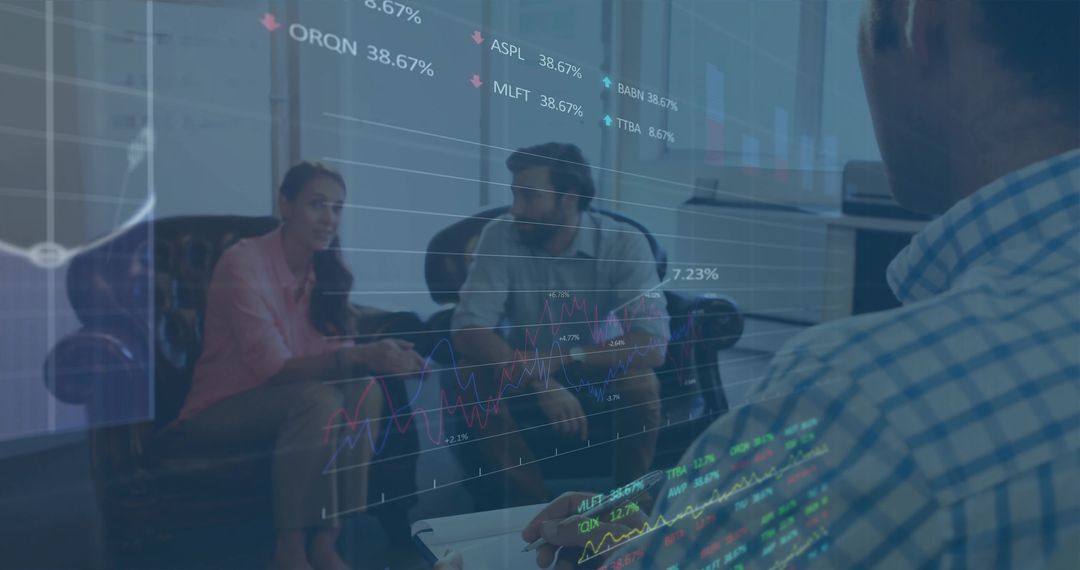 Team Analyzing Financial Data in Modern Office Lounge