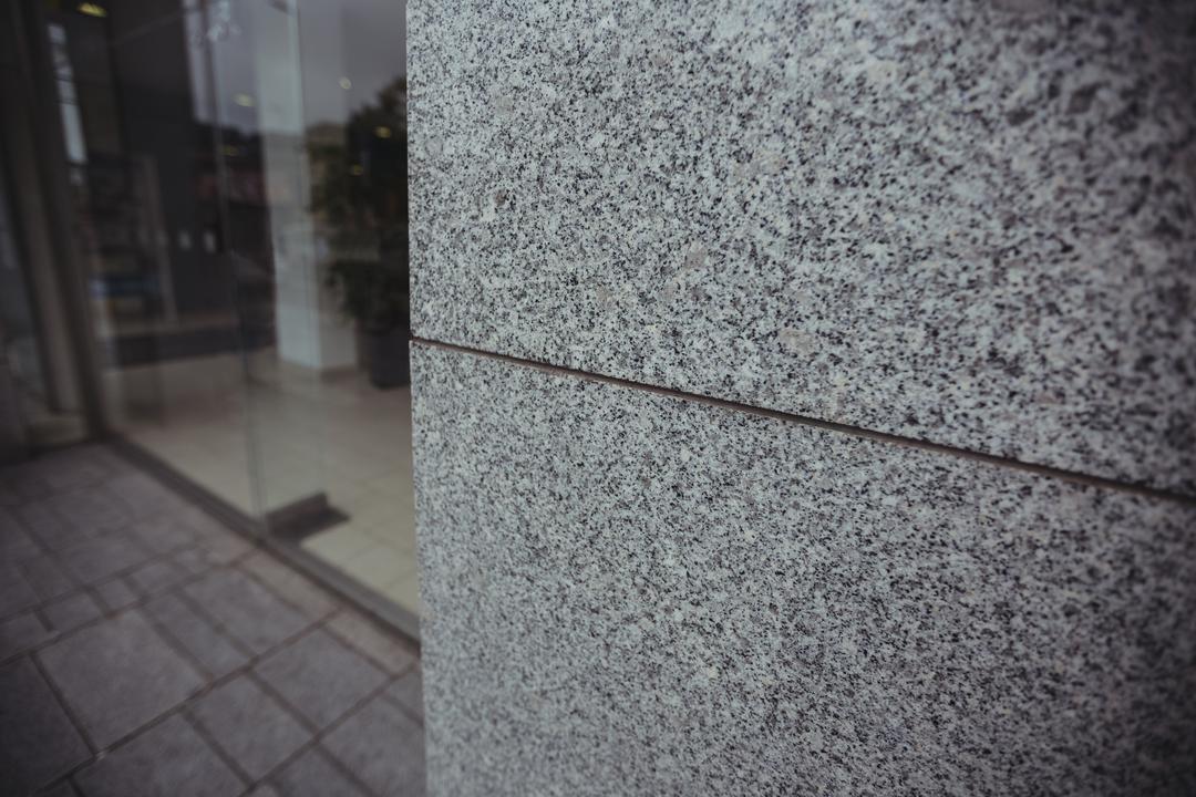 Close-up of modern granite wall in commercial building - Free Images, Stock Photos and Pictures on Pikwizard.com