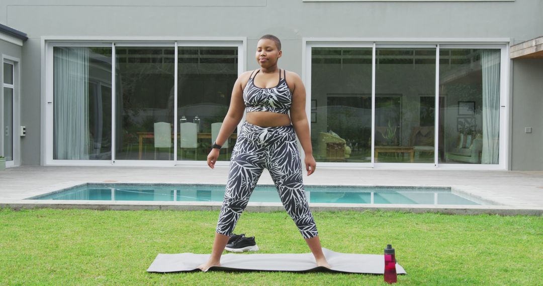 Woman in Activewear Doing Outdoor Yoga by Pool - Free Images, Stock Photos and Pictures on Pikwizard.com