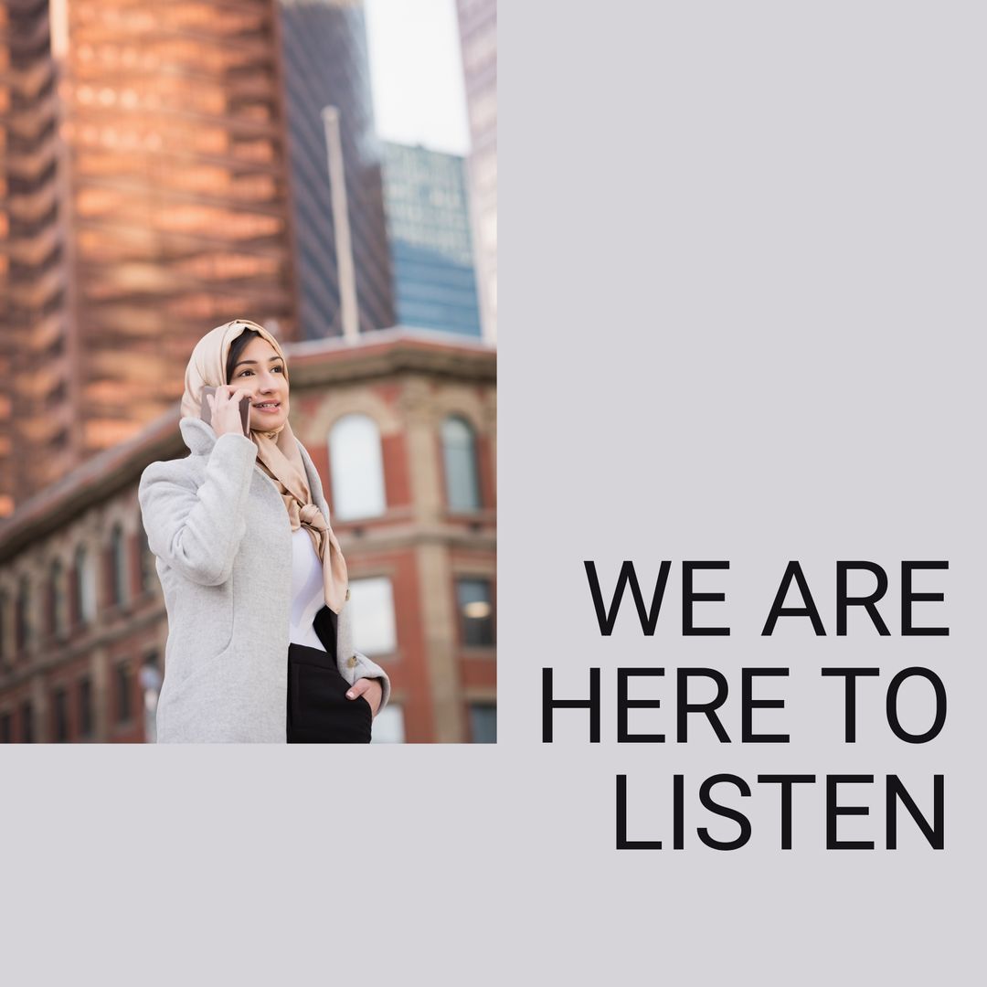 Confident Woman in Hijab Talking on Phone in Urban Setting