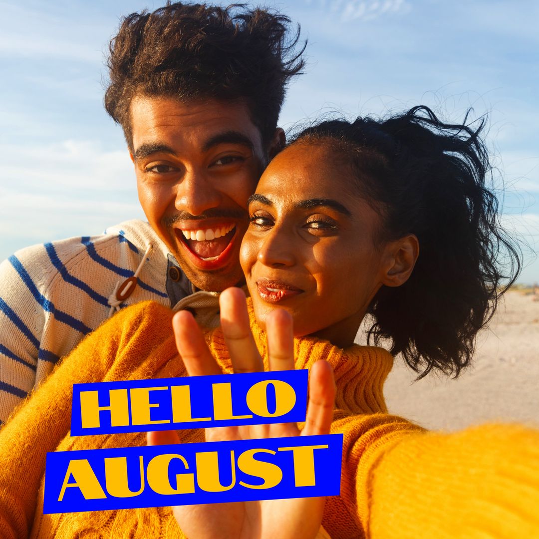 Smiling Couple on Beach Holding Hello August Sign