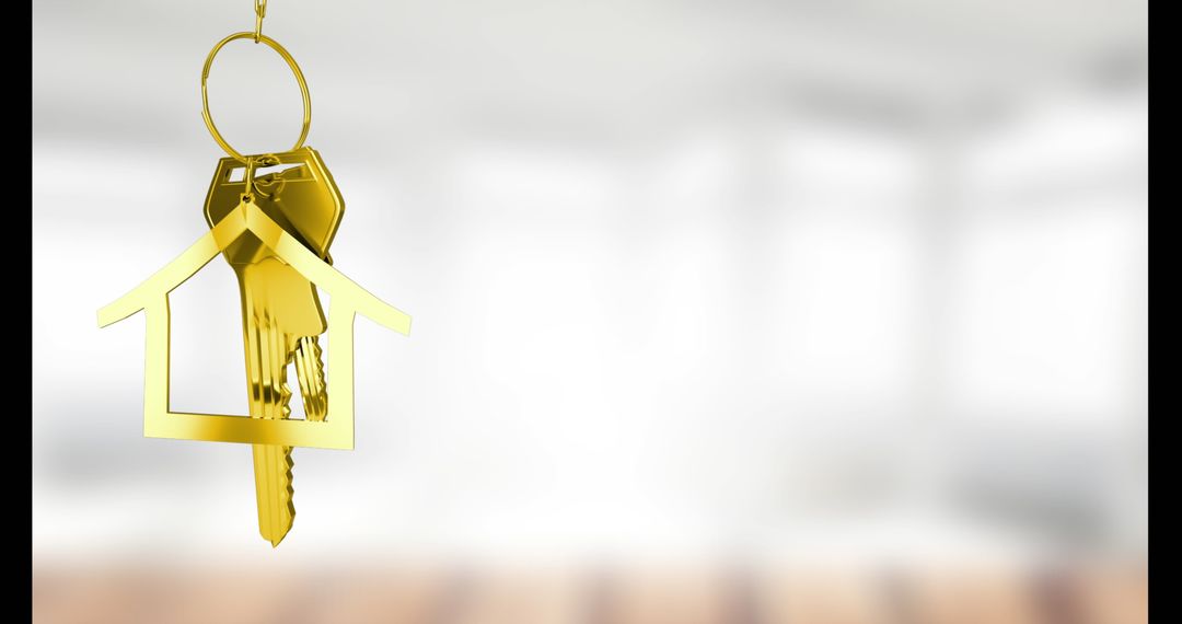 Gold Keychain in Shape of House Symbolizing New Home