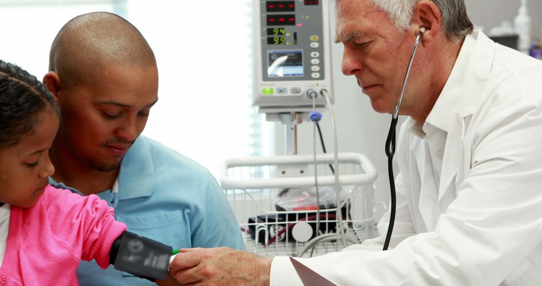 Doctor Measuring Blood Pressure of Child with Father - Free Images, Stock Photos and Pictures on Pikwizard.com