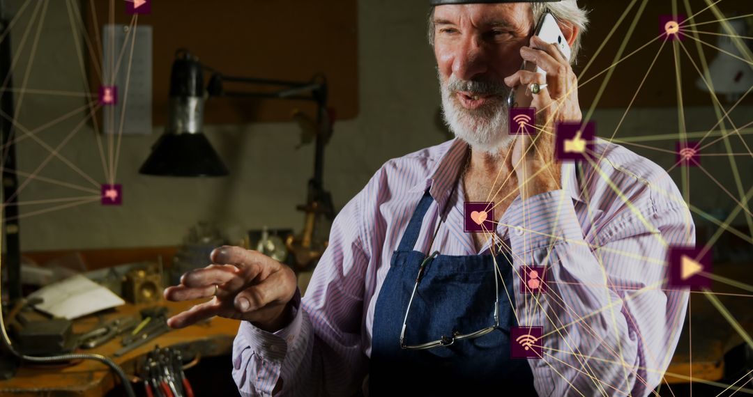 Senior Craftsman with Smartphone and Technology Overlay Network - Free Images, Stock Photos and Pictures on Pikwizard.com