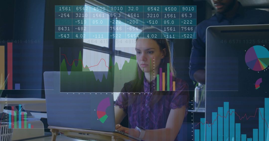 Business Woman Analyzing Data on Laptop with Charts in Modern Office
