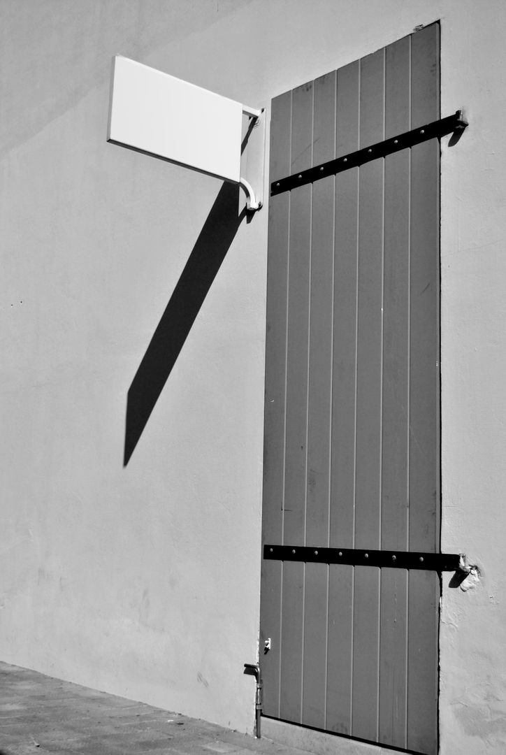 Minimalistic Black and White Door with Shadow - Free Images, Stock Photos and Pictures on Pikwizard.com