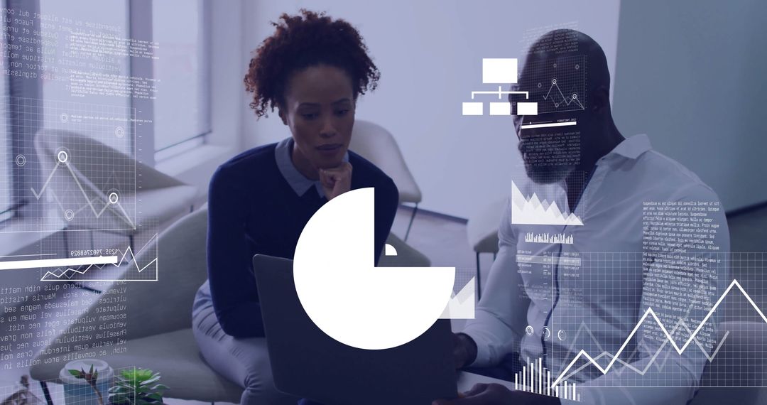 Business Professionals Analyzing Data on Laptop with Overlay Graphics