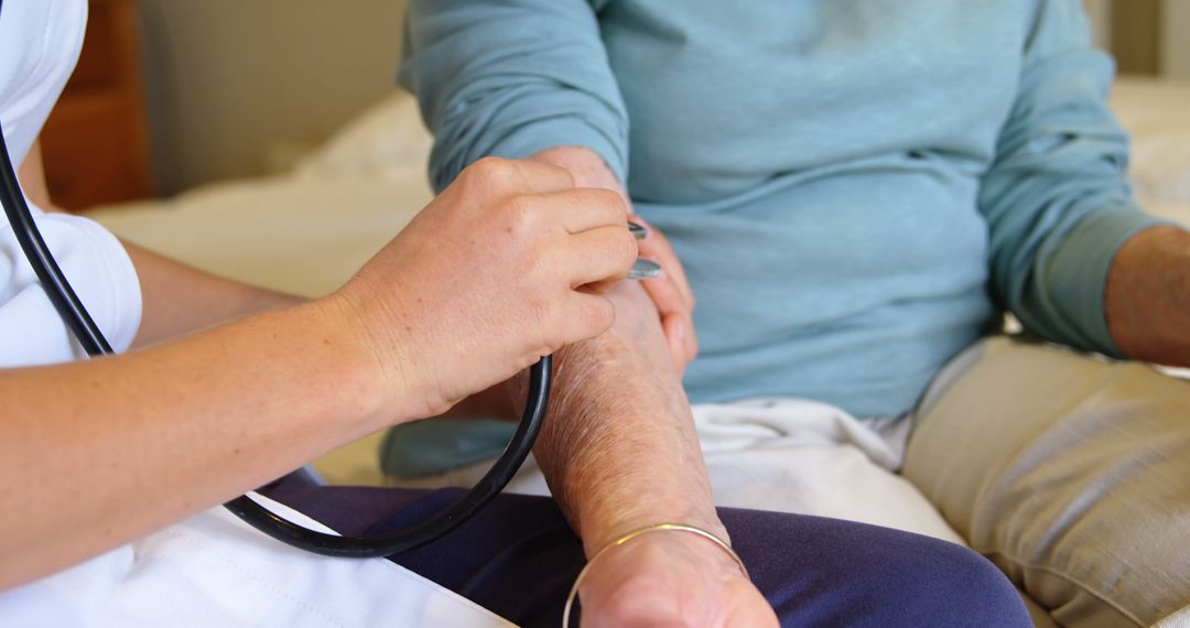 Close-up of nurse checking elderly patient's blood pressure - Free Images, Stock Photos and Pictures on Pikwizard.com