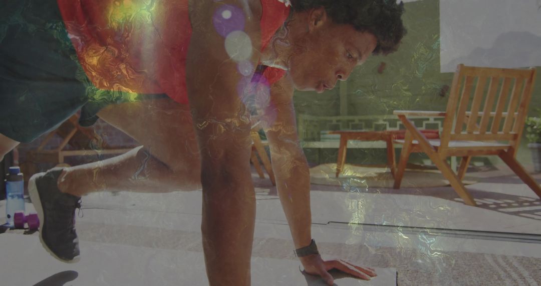 Man Practicing Plank on Patio for Fitness Motivation