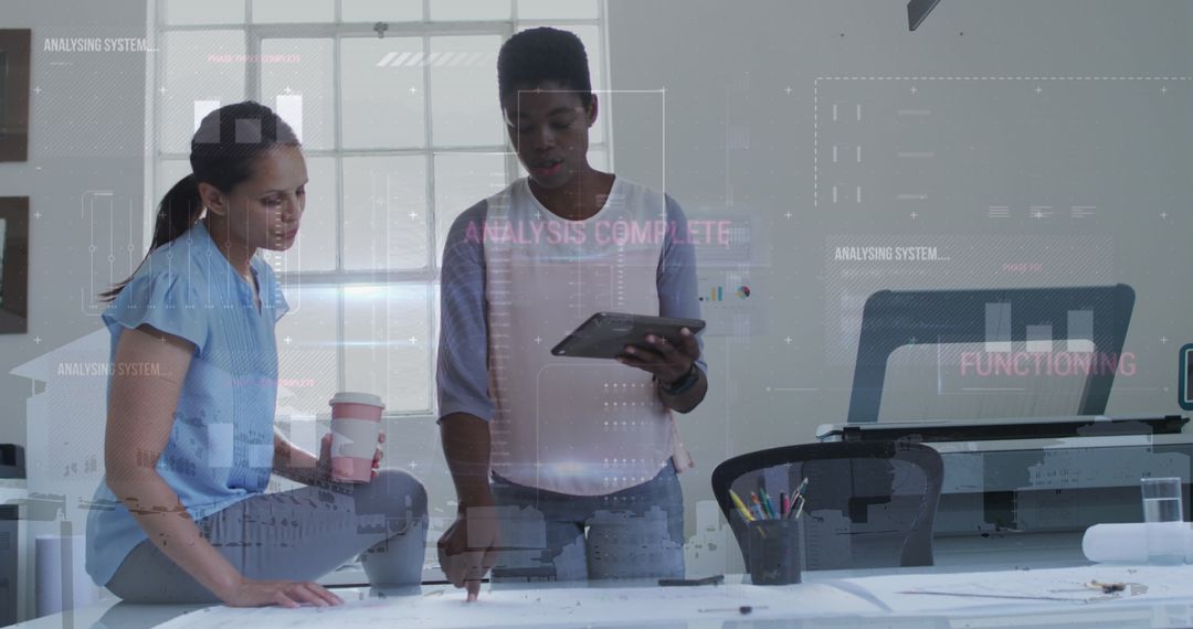 Diverse Colleagues Analyzing Financial Data at Modern Office