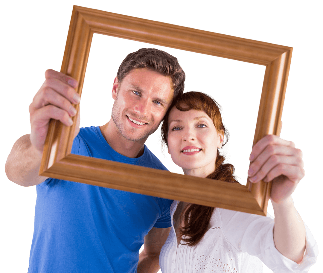 Smiling Couple Holding Wooden Frame and Looking Through