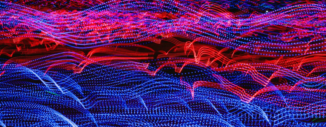 Abstract Blue and Red Light Streaks Forming Waves - Free Images, Stock Photos and Pictures on Pikwizard.com