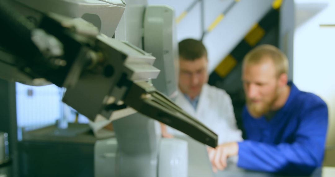 Engineers Conducting Tests on Robotic Arm in Research Lab - Free Images, Stock Photos and Pictures on Pikwizard.com