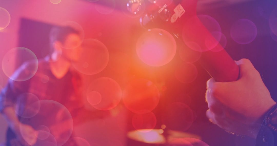 Dynamic Guitar Performance with Bokeh Lighting Effects