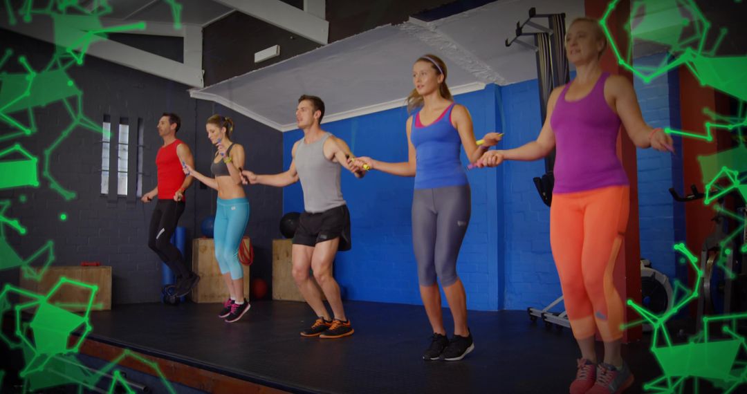 Group Jump Rope Fitness Class Jumping on Stage with Bright Workout Gear and Green Overlays