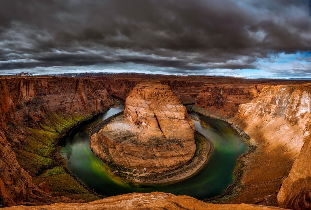 Dramatic Cloudy Sky Over Horseshoe Bend - Free Images, Stock Photos and Pictures on Pikwizard.com