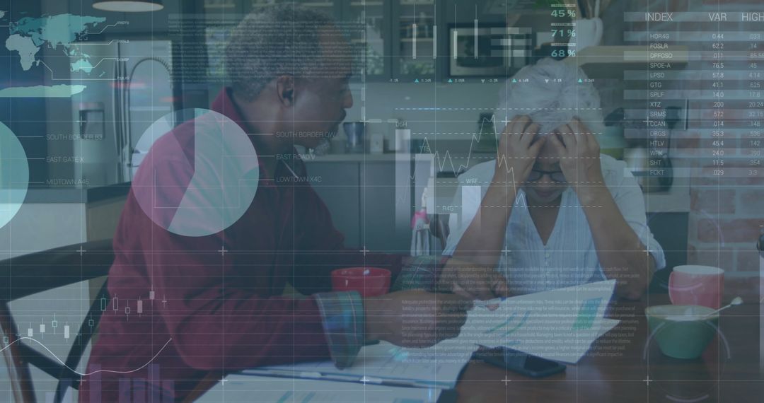 Senior Couple Analyzing Financial Data at Home