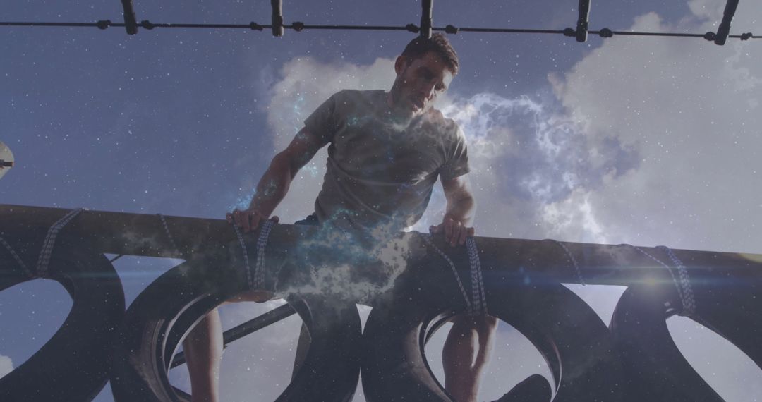Determined Man Climbing Obstacle Course Highlighting Strength