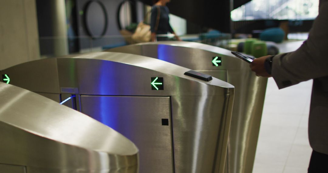 Businessman Using Access Card at Office Turnstile