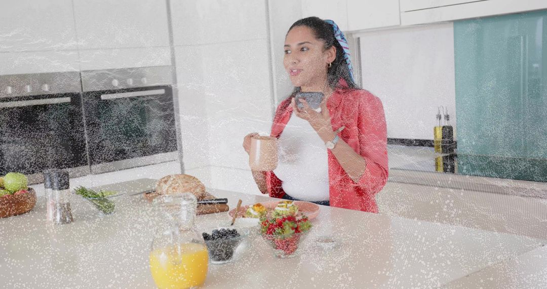 Woman in Red Blazer Using Smartphone While Preparing Breakfast