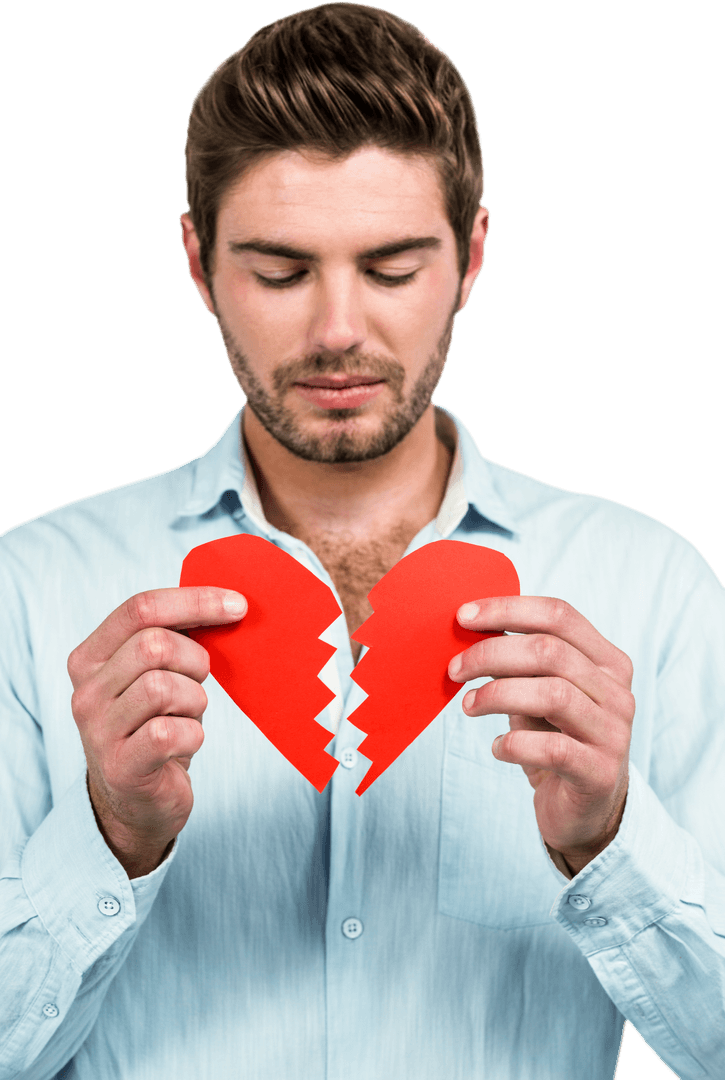 Melancholic Man Holding Torn Red Heart Symbol Implies Heartbreak