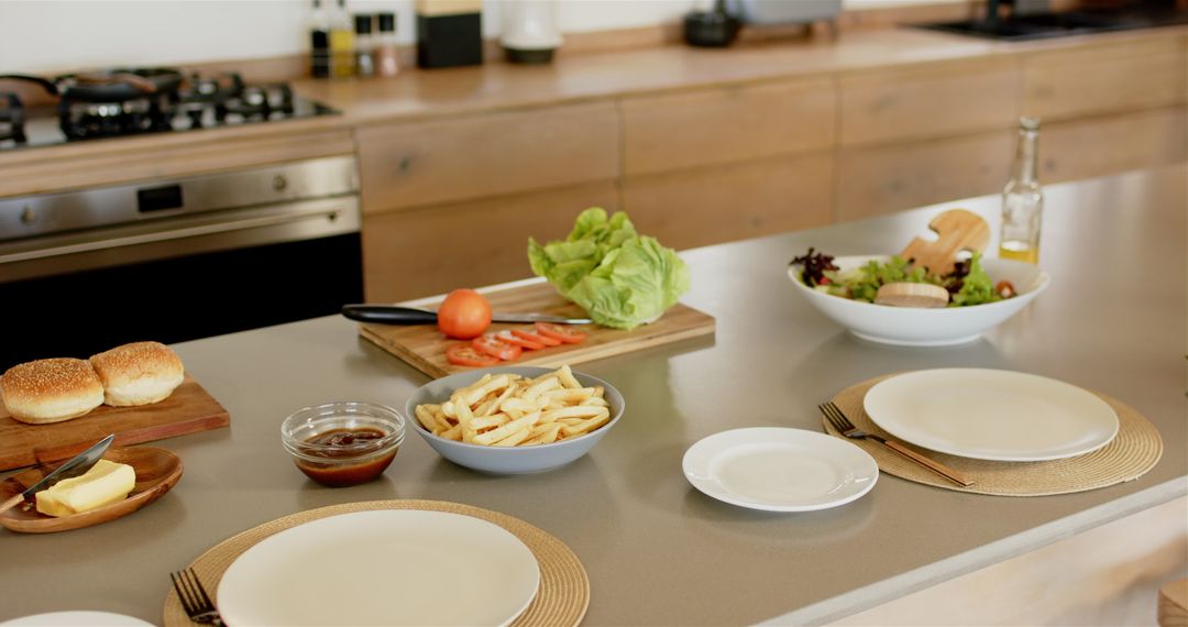 Preparing Vegetarian Meal with Buns and Fries in Modern Kitchen