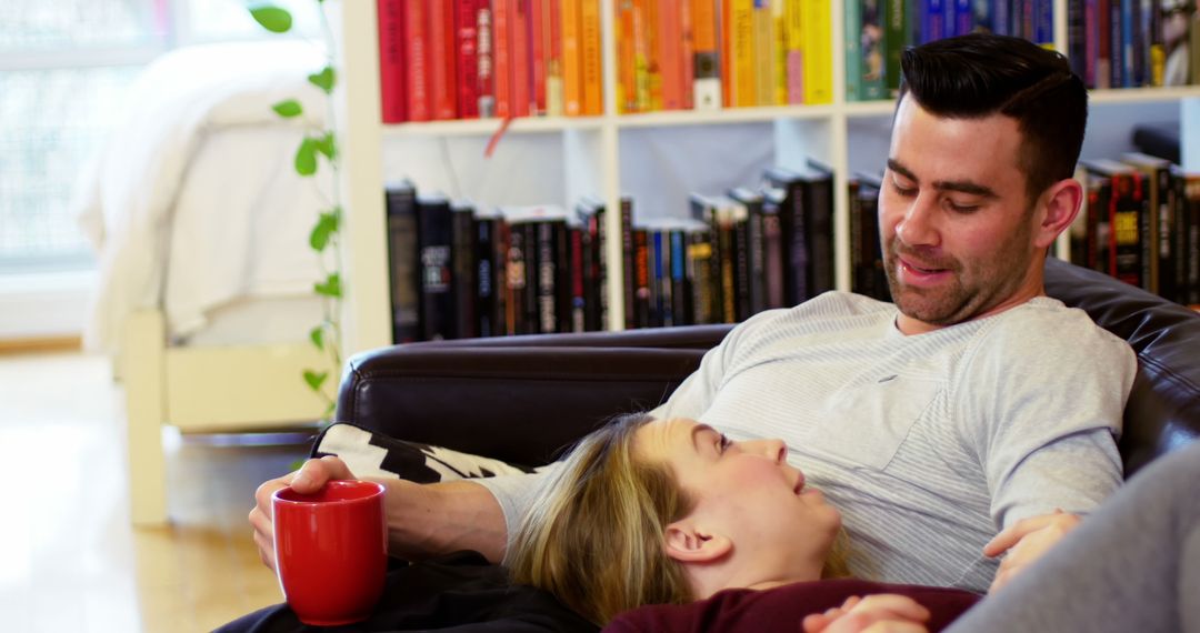 Relaxed Couple Enjoying Time Together at Cozy Home Setting
