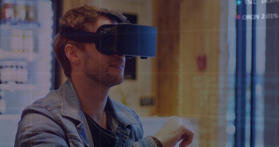Man Engaging with Digital World Through VR Headset Technology
