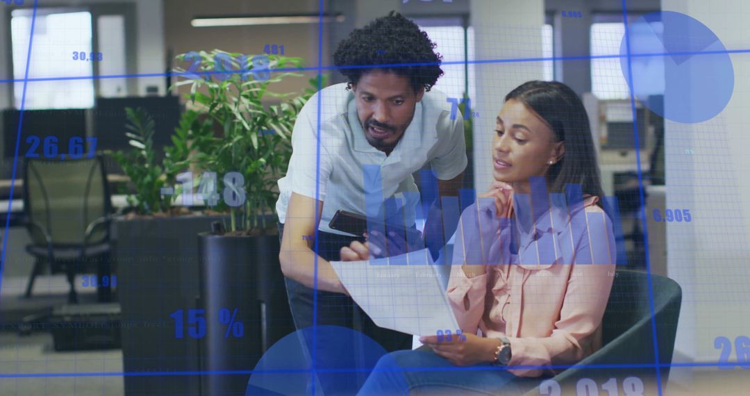 Financial Data Overlay on Diverse Business Colleagues Collaborating in Office