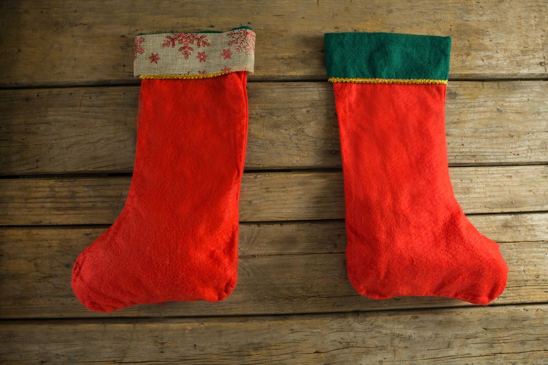 Christmas stocking on wooden wall - Free Images, Stock Photos and Pictures on Pikwizard.com