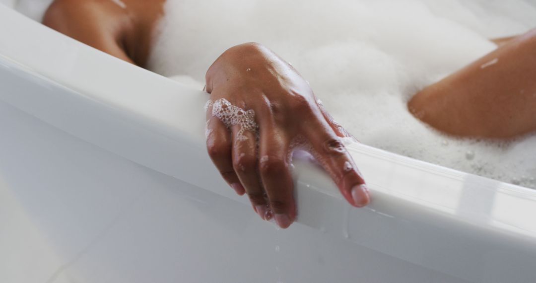 Close-Up of Woman Relaxing in Warm Bubble Bath