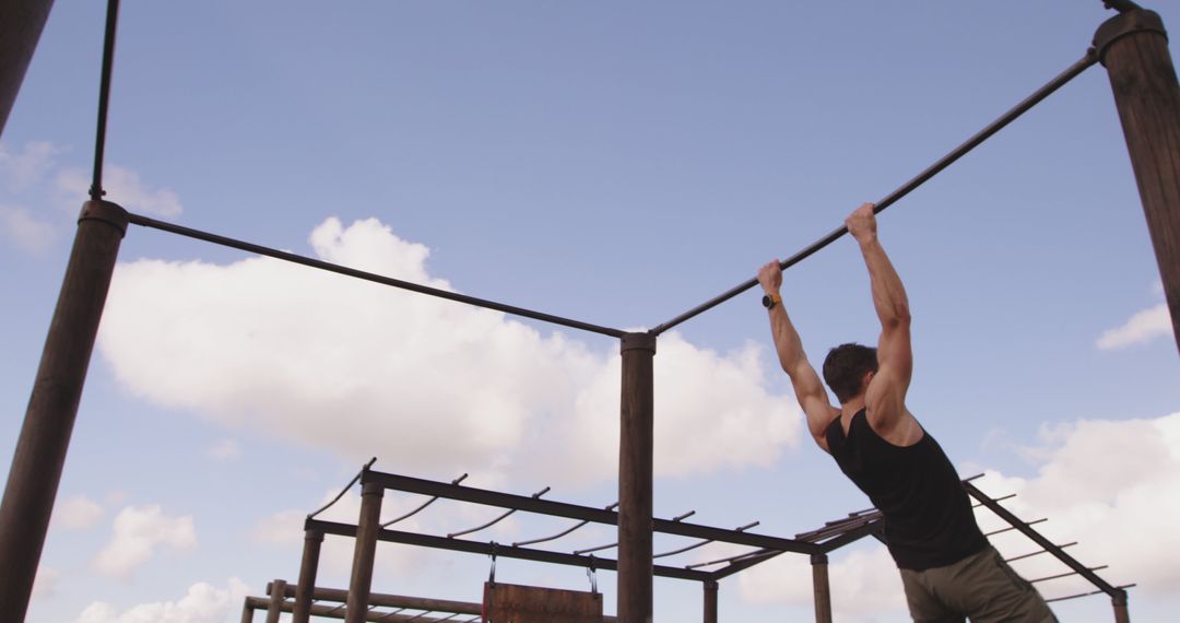 Athlete Doing Pull-Ups on Outdoor Fitness Equipment - Free Images, Stock Photos and Pictures on Pikwizard.com