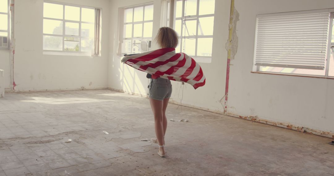 Woman Dancing with American Flag in Abandoned Room - Free Images, Stock Photos and Pictures on Pikwizard.com