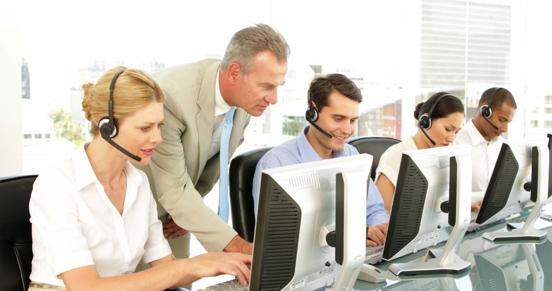 Business Team Focused Working in Call Center Office - Free Images, Stock Photos and Pictures on Pikwizard.com