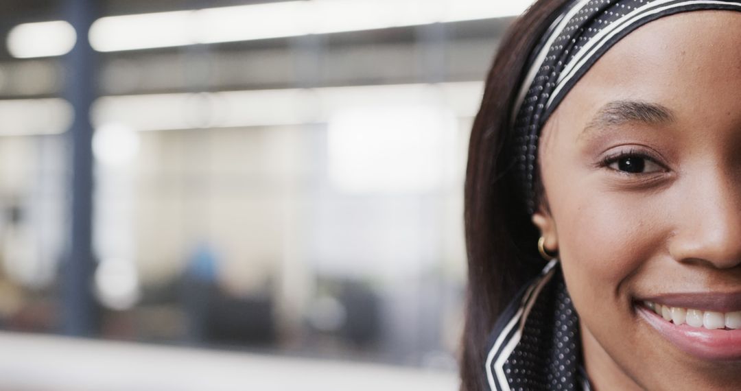 Smiling African American Professional at Office with Stylish Headband