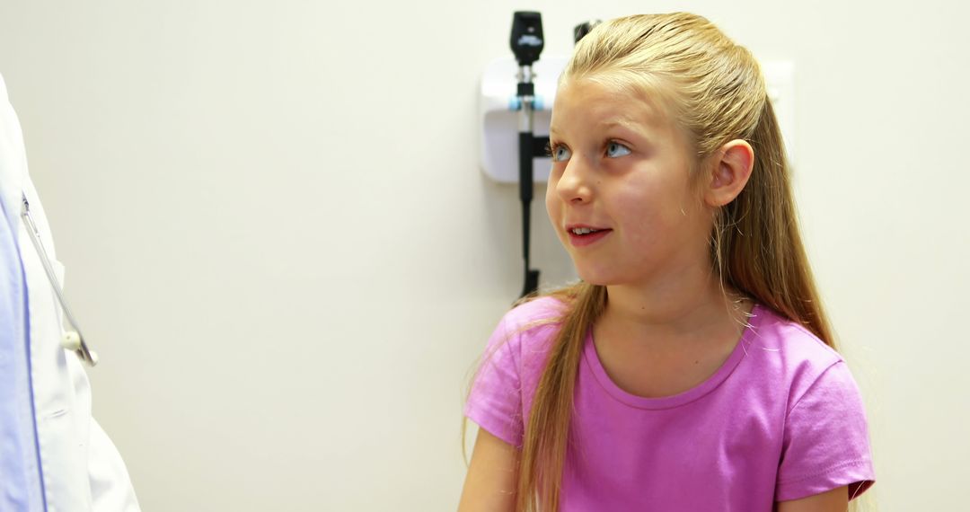 Young Girl Talking with Doctor in Medical Examination Room - Free Images, Stock Photos and Pictures on Pikwizard.com