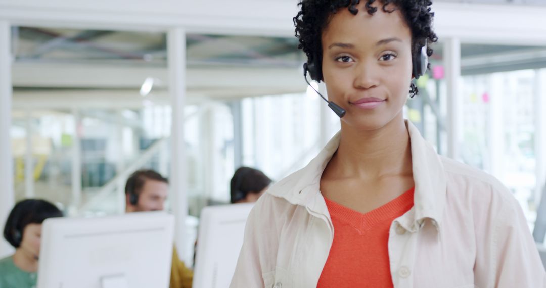 Confident Customer Support Representative Wearing Headset in Modern Office - Free Images, Stock Photos and Pictures on Pikwizard.com