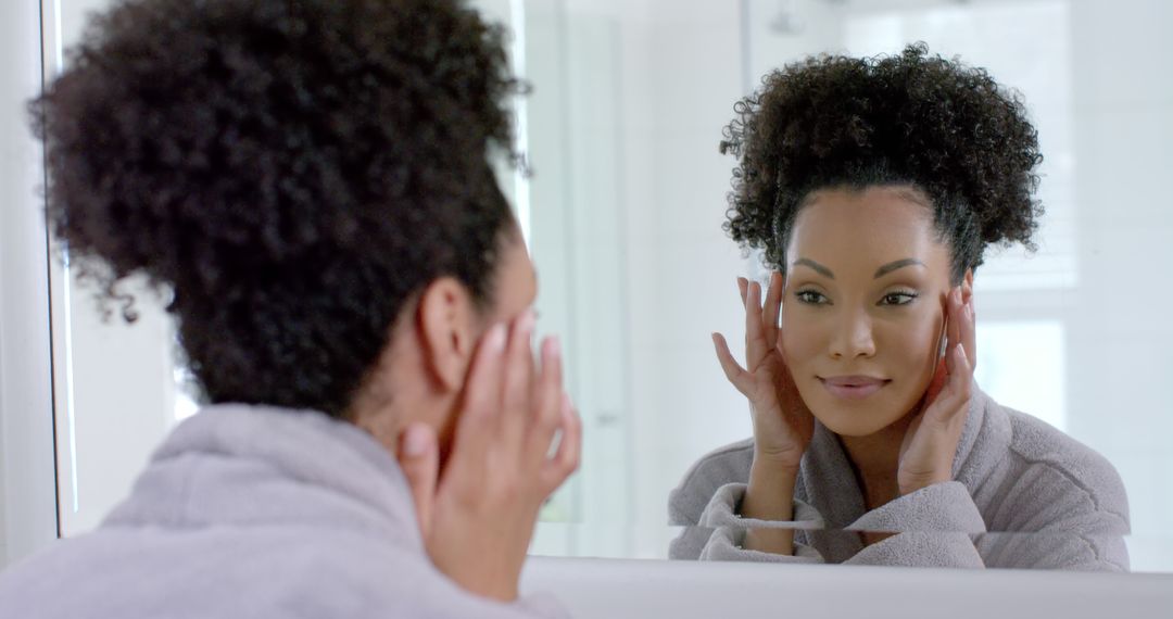 Smiling Woman Caring for Skin in Bathroom Mirror - Free Images, Stock Photos and Pictures on Pikwizard.com