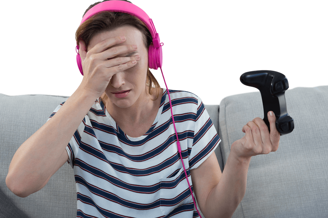Frustrated Gamer Wearing Headphones with Game Controller in Hand Transparent Background