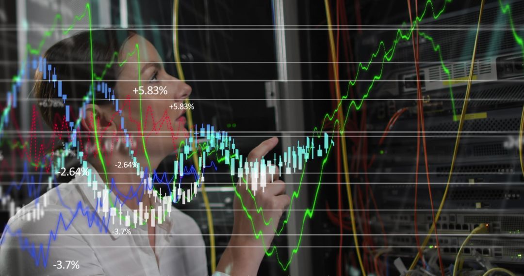 Engineer Analyzing Financial Data in High-Tech Server Room